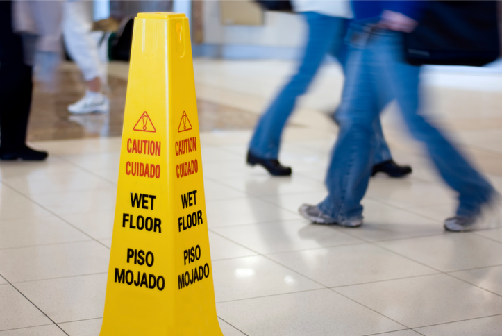Wet floor in crowded walkway