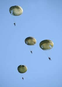 trained servicemen jump school