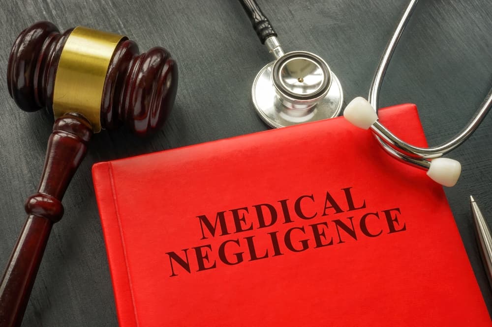 Medical negligence law concept with a stethoscope symbolizing healthcare accountability.