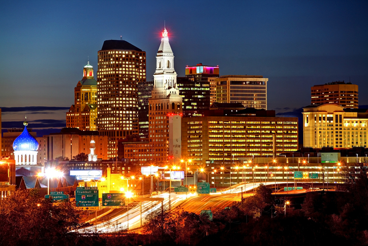 Nighttime view of Connecticut downtown area lit up with lights