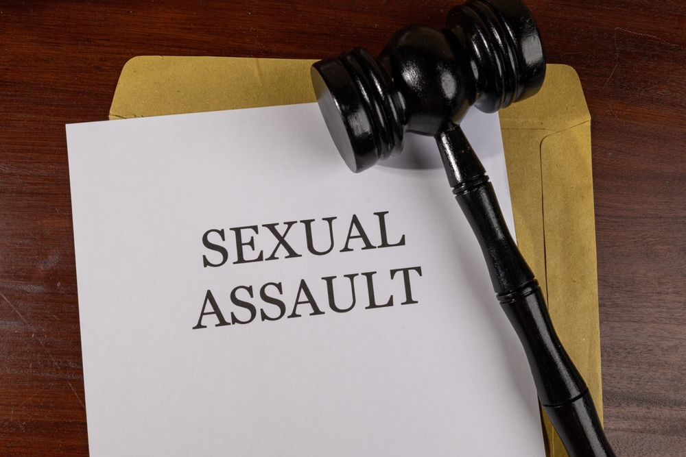A gavel rests on a document labeled “Sexual Assault,” symbolizing legal action and the support a Danbury Sexual Assault Lawyer provides to survivors.