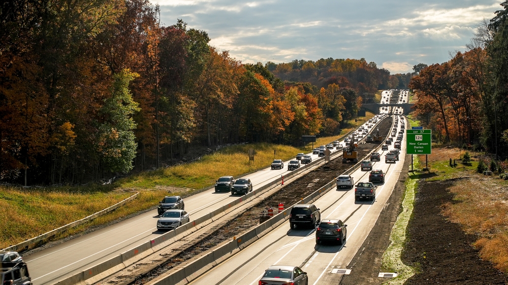 Connecticut car accident lawyer reviewing traffic conditions on a busy Connecticut highway where serious crashes frequently occur.