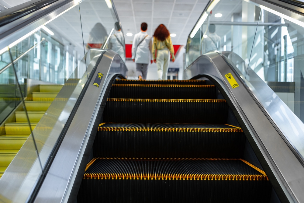 Escalator inside shopping mall where slip and fall incidents can occur relevant to Danbury slip and fall lawyers help after Danbury Fair Mall accidents