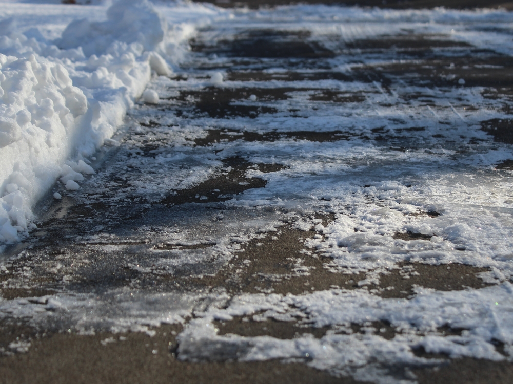 Middletown premises liability lawyers icy sidewalk after snowstorm creating slip and fall hazard.