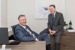 Attorneys Brian and Chris Flood pictured in office