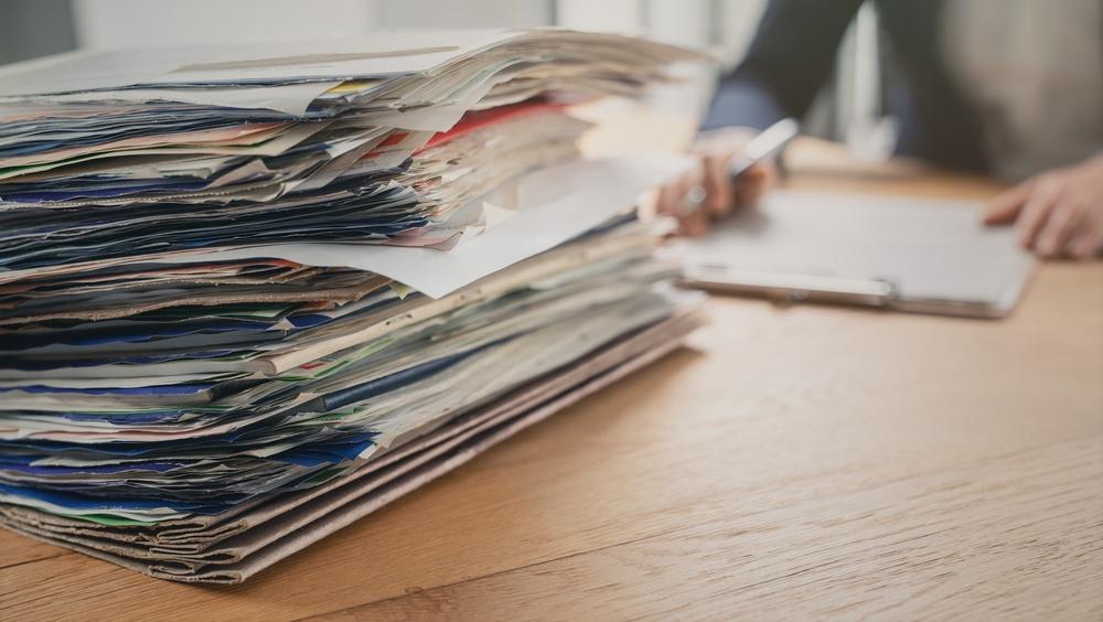 Stylized image of legal team preparing documentation ahead of trial